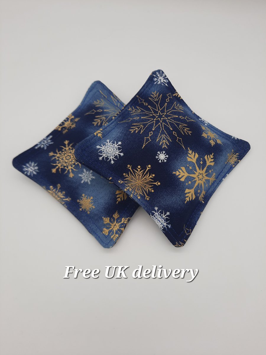 Navy blue snowflake hand warmers, rice bag 4" pads. 