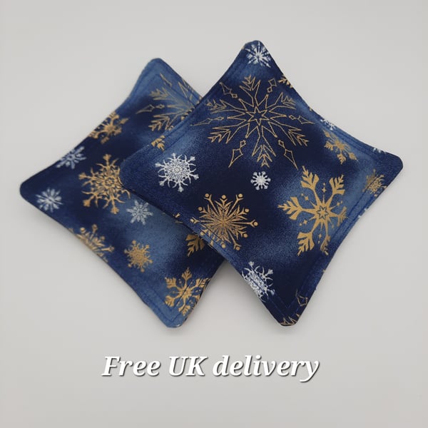 Navy blue snowflake hand warmers, rice bag 4" pads. 