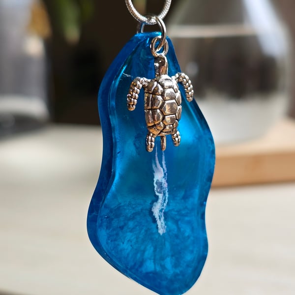Sea Turtle charm on resin necklace with snake chain