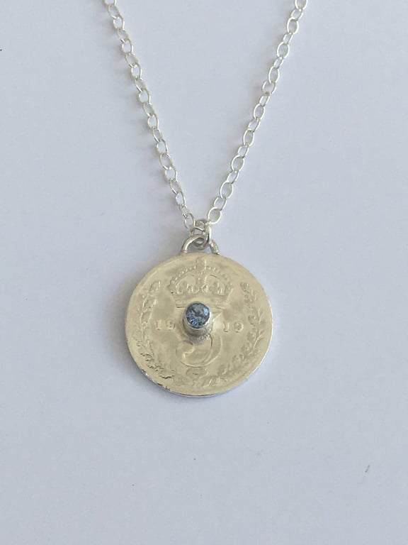 1919 Threepence pendant set with Blue Sapphire 