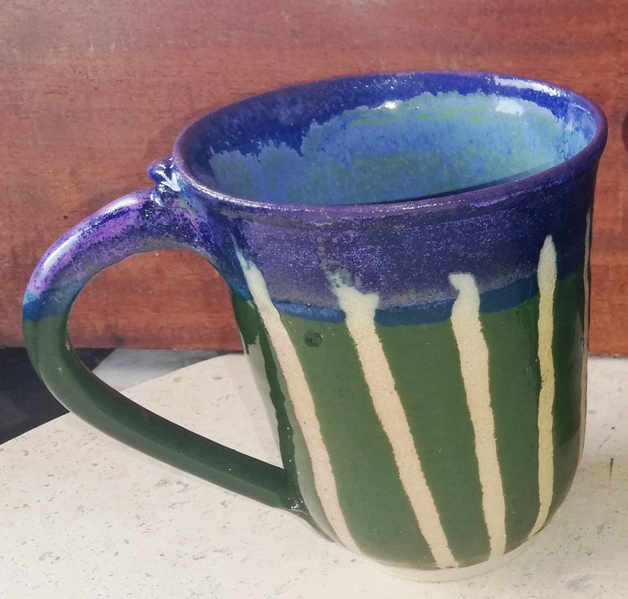 Cheery, wax resist stripy, green and purple, stoneware mugs