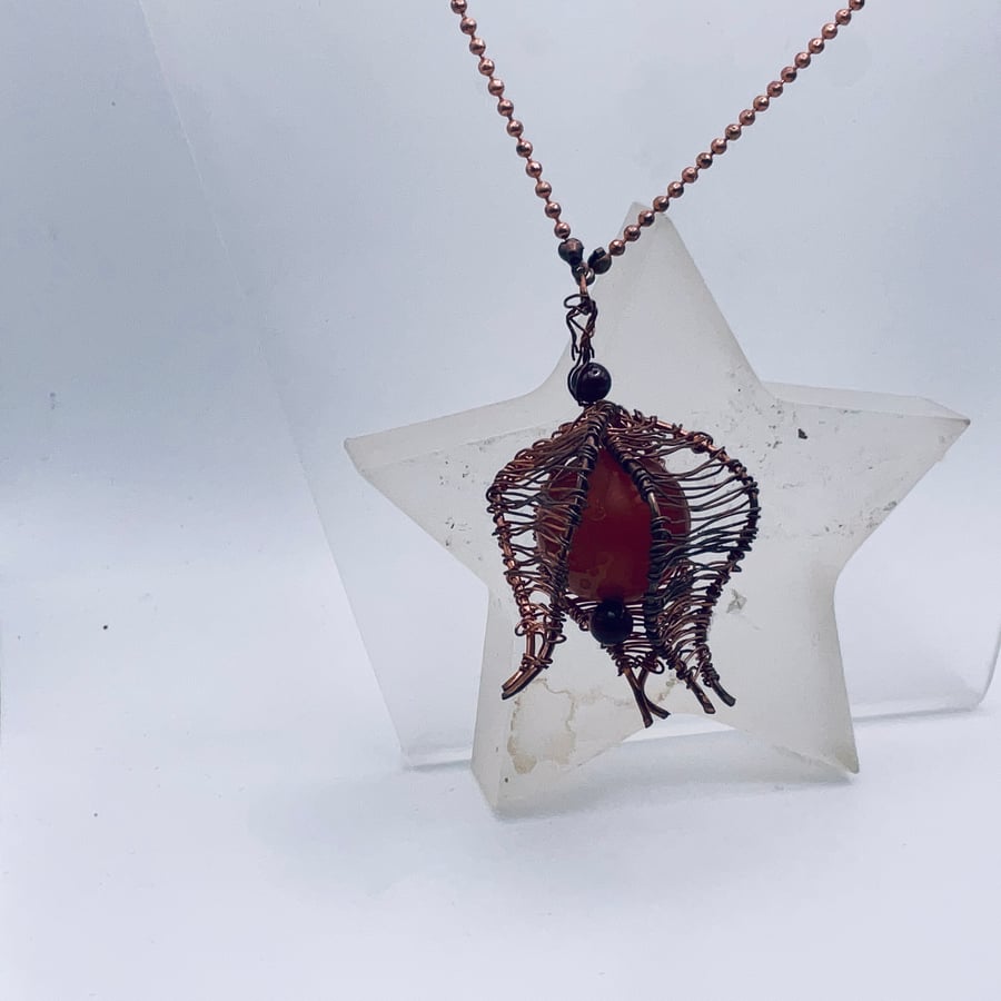 Magnificent large carnelian copper cumquat pendant