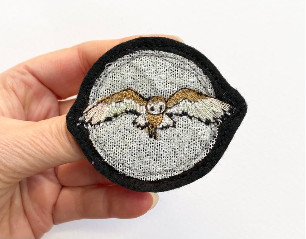 Upcycled flying barn owl brooch pin or badge.