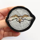 Upcycled flying barn owl brooch pin or badge.