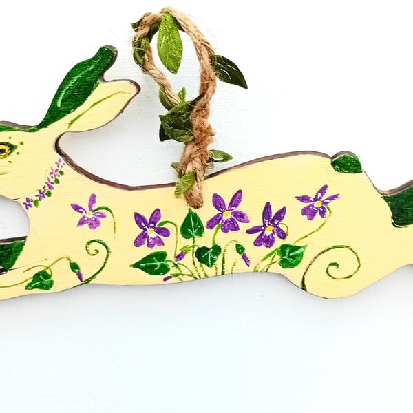 Violet hare  on wood  in cream and dark green