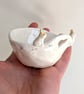 Handmade tealight with 2 tiny bunnies, heart & pawprints. Wedding gift
