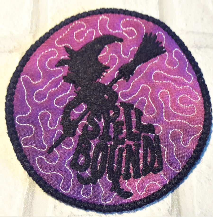 Halloween themed coaster with witch design