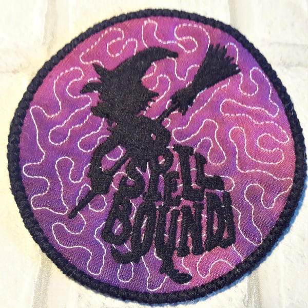 Halloween themed coaster with witch design