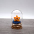 small glass star figure