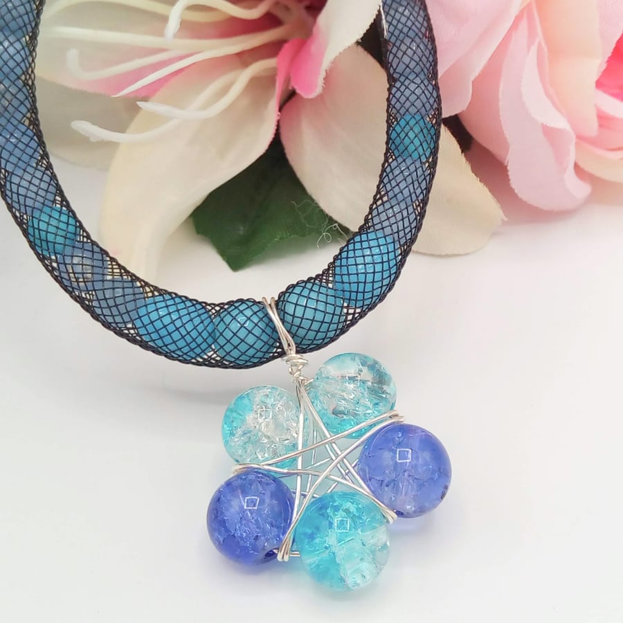 Shades of Blue Wire Wrapped Star Pendant on a Blue Bead Netted Necklace