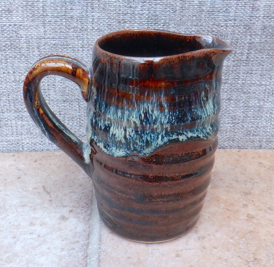 Small jug pitcher pouring hand thrown stoneware pottery ceramic wheelthrown hand