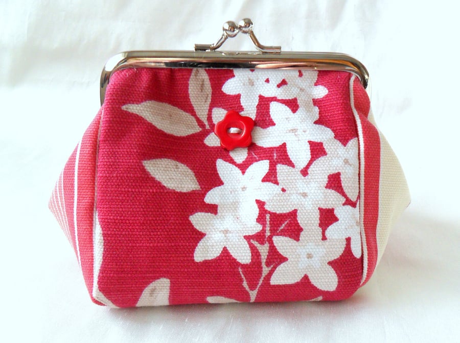 Pink floral purse with kiss lock frame