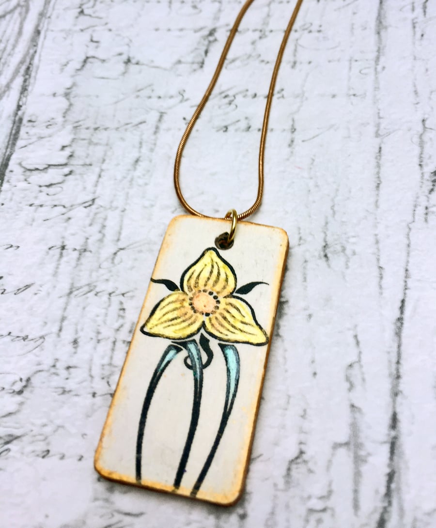 Art Nouveau Stylised Daffodil pendant on wood hand painted iridescent finish