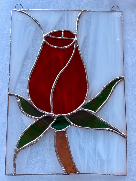 Stained glass red rose on white background
