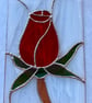 Stained glass red rose on white background