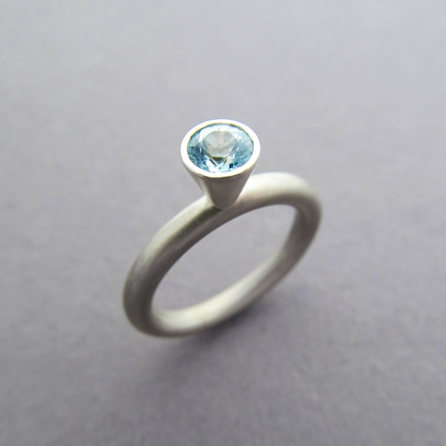 Silver and Topaz Solitaire Ring