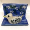 Business card holder with bird decoration