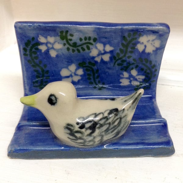 Business card holder with bird decoration