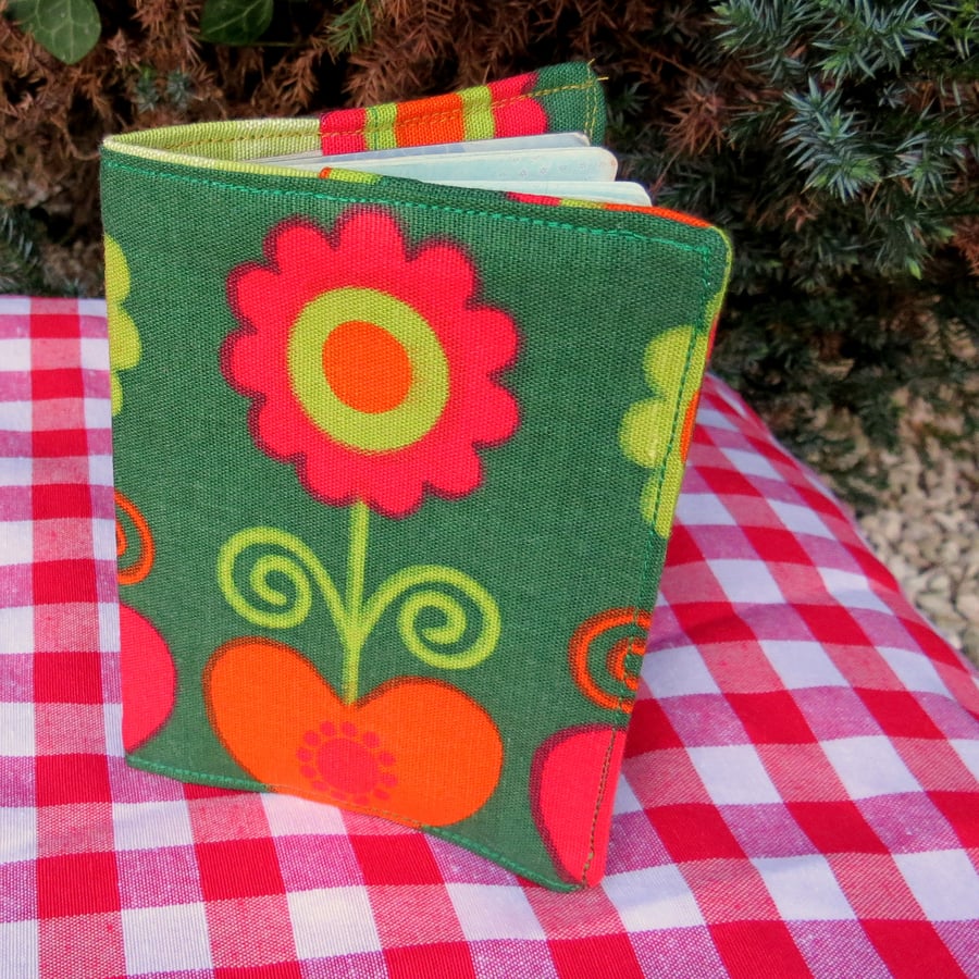 A passport cover.  Made from a groovy 1960s cotton.  Passport sleeve.