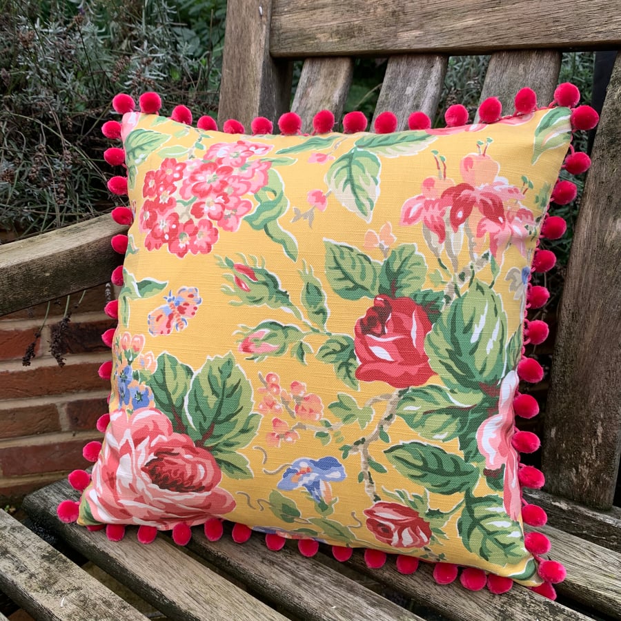 Yellow floral cushion cover with Pom Pom trim