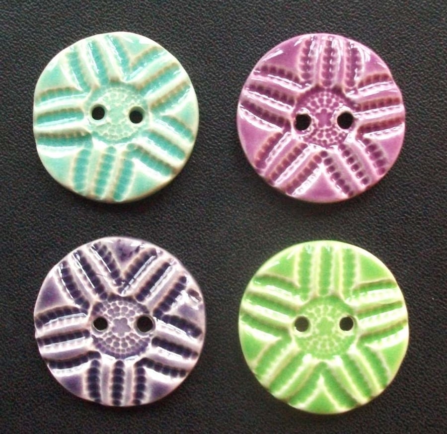 Set of four large ceramic buttons