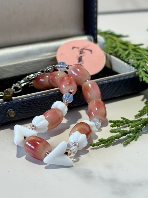 Vintage glass bead bracelet in pink and white.