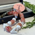 Vintage glass bead bracelet in pink and white.