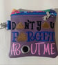 Don't you forget about me  -  Embroidered Poo bag dispenser. 