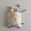 Pouch or make up bag upcycled from a floral vintage embroidery