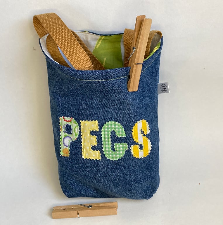 Denim Peg Bag with appliqué decoration. Over-the-shoulder design
