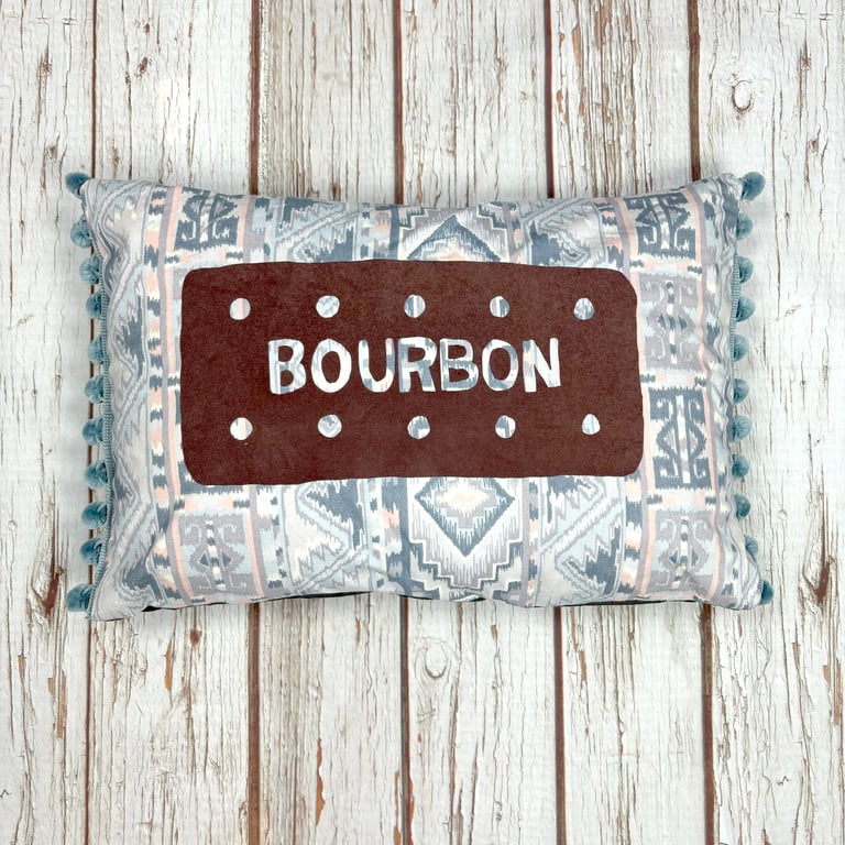 Bourbon Biscuit Cushion Cover on Vintage grey fabric