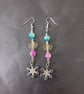 Silver frosty themed snowflake charm dangle earrings  - Image 1