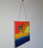Wall art of a sunset island - adjustable hang length - Image 2
