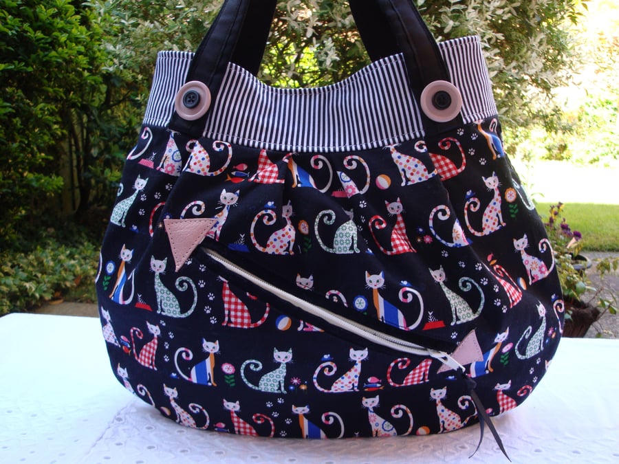 Cotton Handbag - multi coloured cats  - external zip pocket - leather detail.