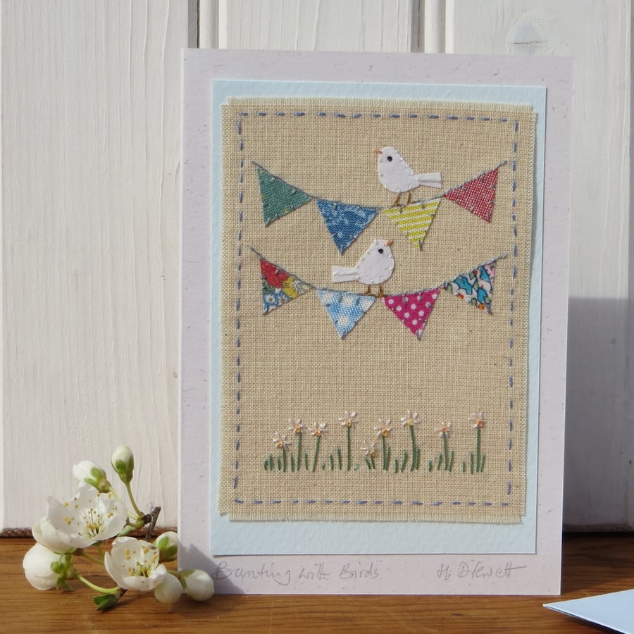 Hand-stitched mini bunting, little white doves, pretty card to keep!