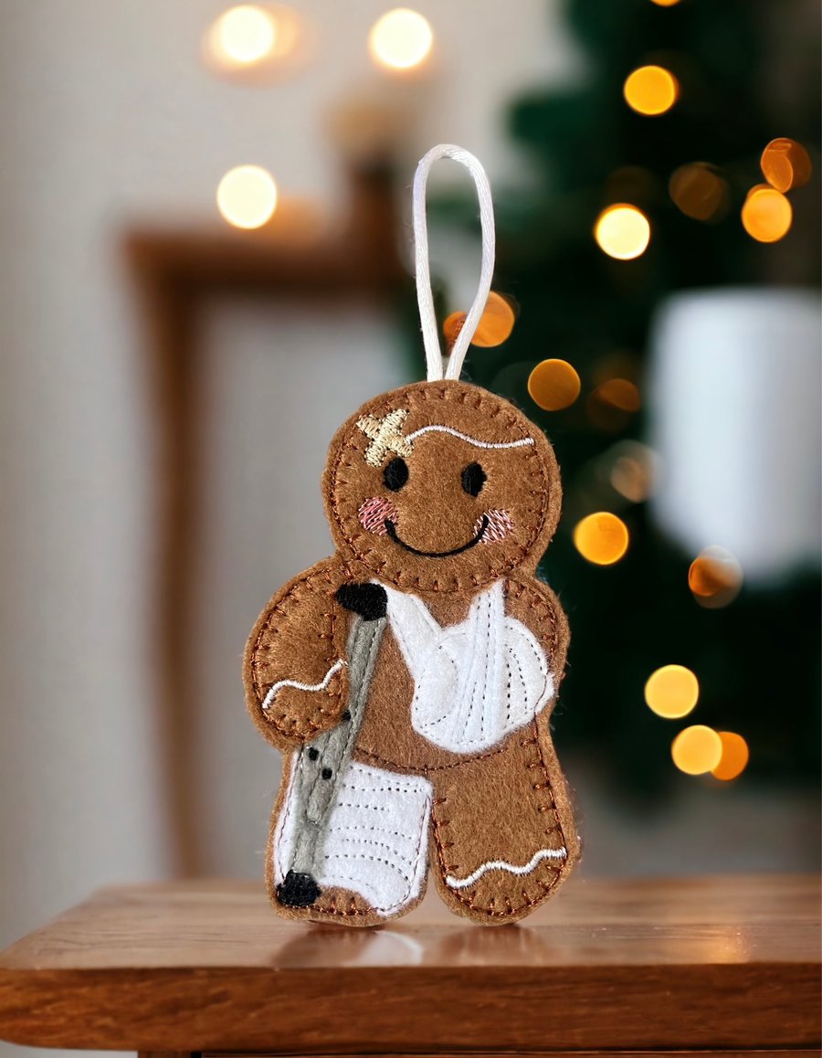 Gingerbread man lady with broken arm and leg Embroidered Hanging Keepsake 