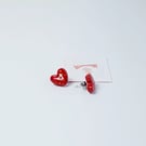 Heart shaped red sparkle studs