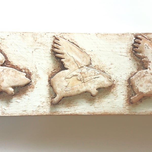 Three Flying Pigs Right-Facing, Mounted 