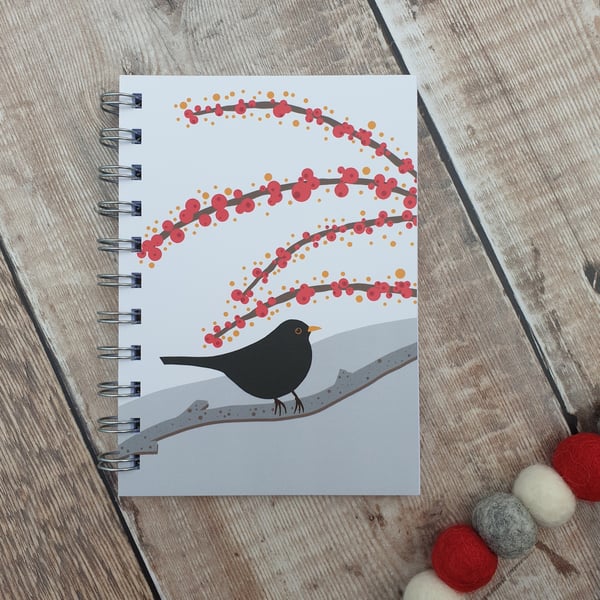 Blackbird in the snow A6 Notebook