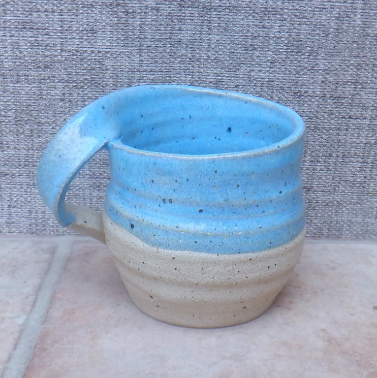 Left handed coffee mug tea cup in stoneware hand thrown ceramic pottery