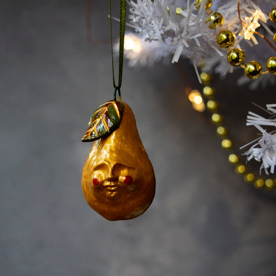 Peter K pear ceramic hanging ornament. Golden pear