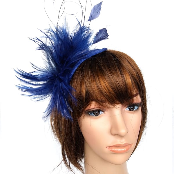 Dark blue fascinator with feathers