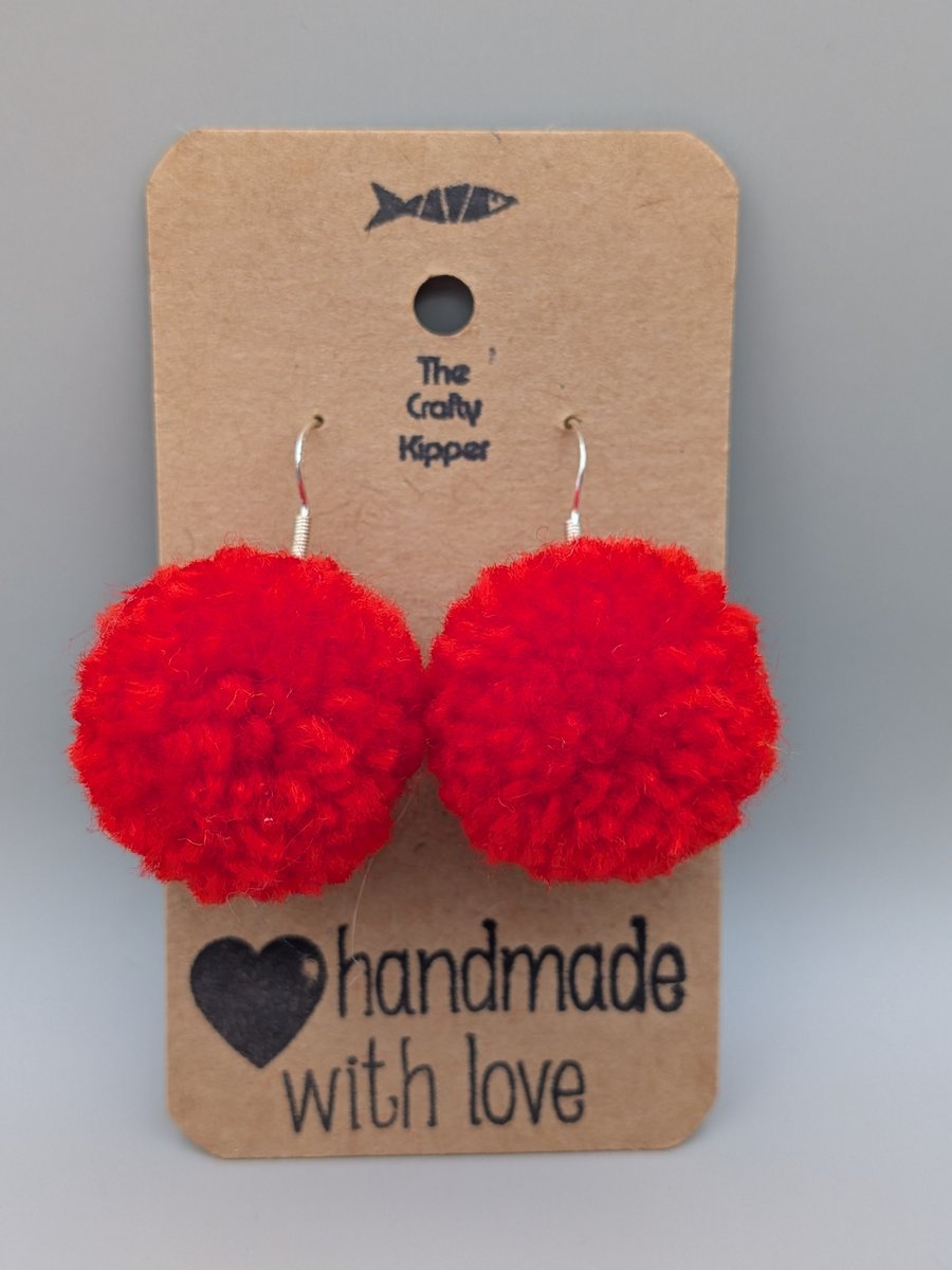 Handmade pom pom earrings.