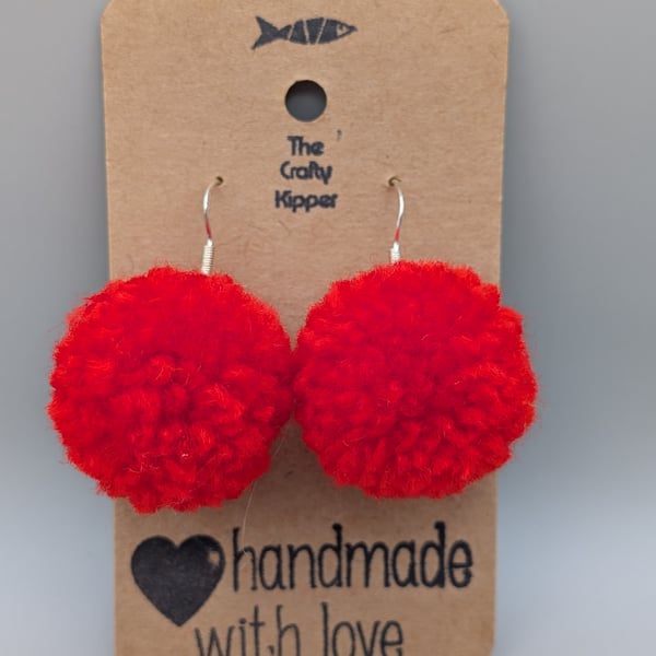 Handmade pom pom earrings.