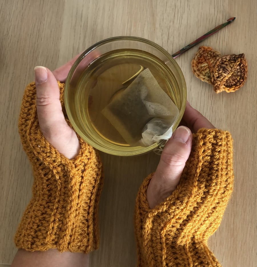 Fingerless gloves, pumpkin coloured wristwarmers, crocheted