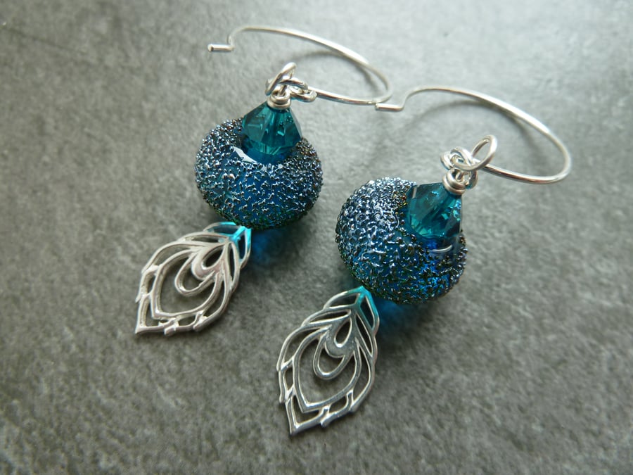 sterling silver earrings, sparkly blue lampwork glass and peacock feather