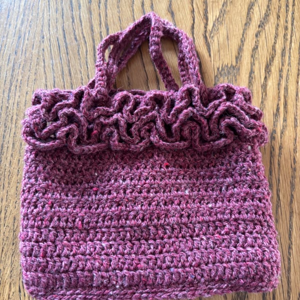 Small frilly crochet handbag, cute and pretty, ideal for holding a few essential
