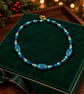 Handmade Ceramic Turquoise Cobalt Teal Beaded Necklace, Gold Clasp - Image 1