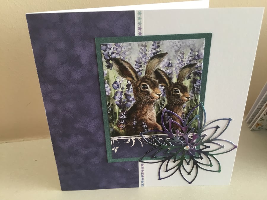 Two hares in purple 