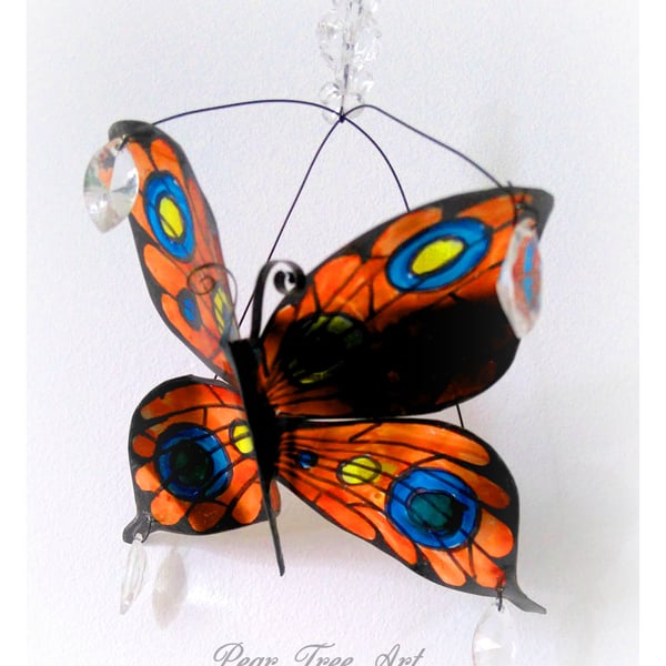 Handmade Orange Metal Butterfly hanging decoration. Made from a coffee tin.